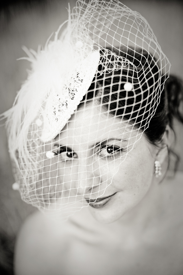 white bird-cage veil with pearls - wedding photo by Christine Meintjes Photography